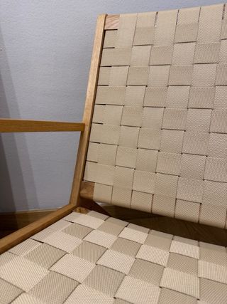 Poltrona in legno e rattan intrecciato