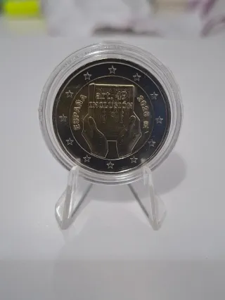 2€ España 2026 Art. 49 Inclusión