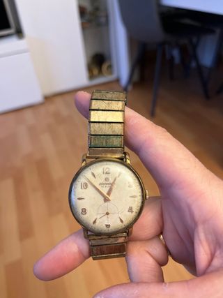 Reloj Junghans Dorado y Blanco