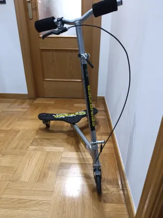 Cómo nuevo Patinete 3 Ruedas Spin Rider