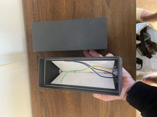 Lampada da muro grigia con vetro