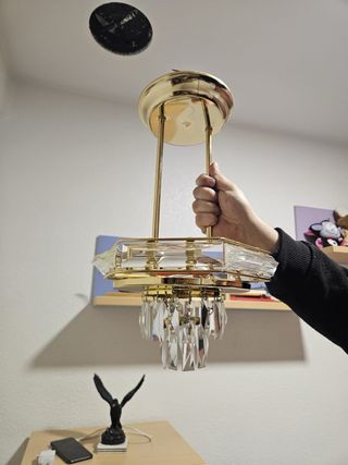 Lámparas colgante dorada y transparente