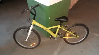 Bicicleta infantil B'twin 20 amarilla de 6 a 8años