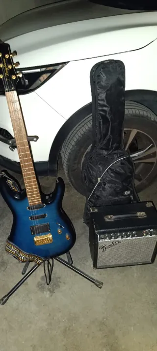 Guitarra eléctrica azul poco uso Daytona y ampli.