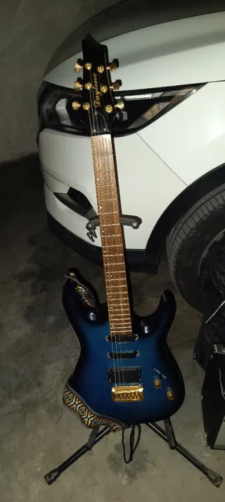 Guitarra eléctrica azul poco uso Daytona y ampli.