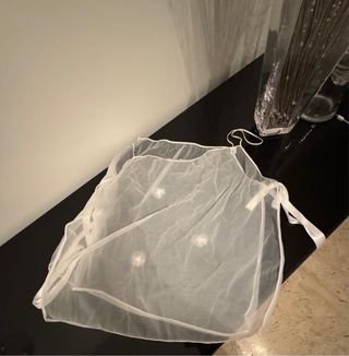 Top donna trasparente con fiori