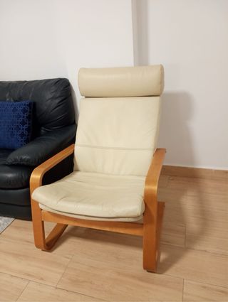 Sofás de piel  sillón beige y una messa