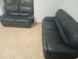 Sofás de piel  sillón beige y una messa