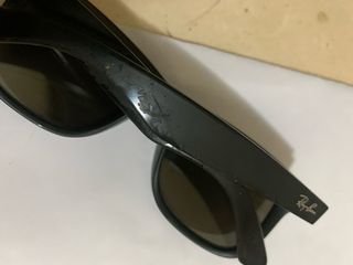 Occhiali da sole Ray-Ban neri e oro