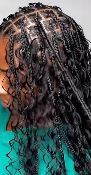 Trenzas de caja con extensiones naranjas