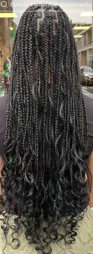 Trenzas de caja con extensiones naranjas