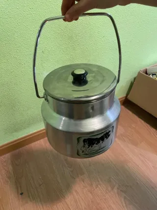 Lechera antigua de aluminio
