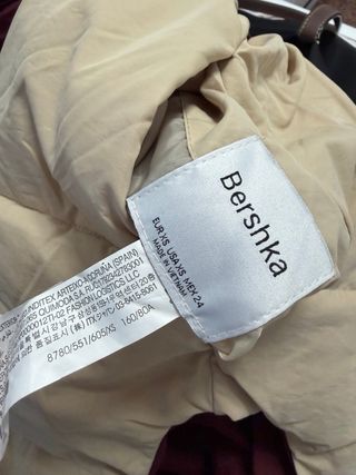 Chaleco reversible beige y rojo