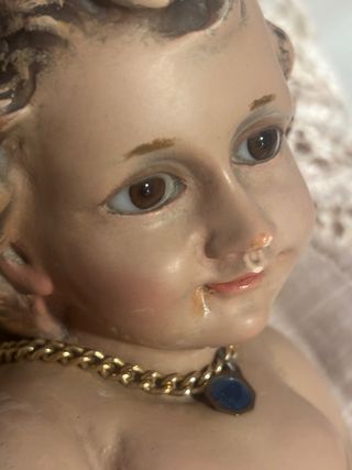 Niño Jesús en cuna de ramas