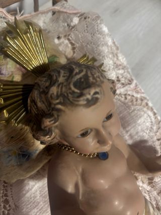 Niño Jesús en cuna de ramas