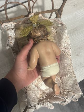 Niño Jesús en cuna de ramas