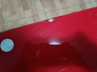 Mesa de centro cristal rojo y metal