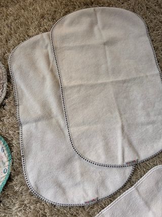 Protectores para pañales y para dar el biberon