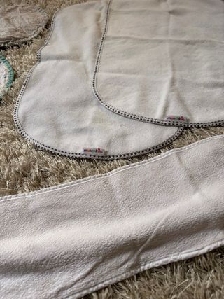 Protectores para pañales y para dar el biberon