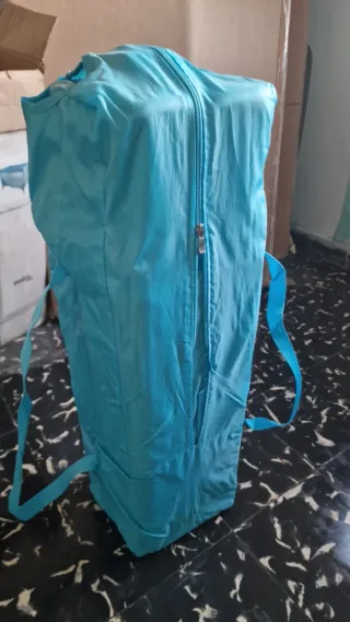 Cuna de viaje azul