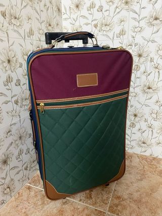 Maleta de viaje azul y verde