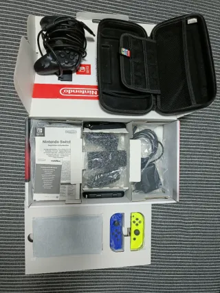 Nintendo Switch + 3 Juegos y Accesorios