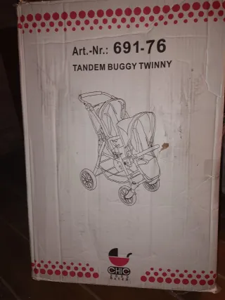 Carro gemelar gris para muñecas
