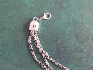 Pulsera Acero Plateada logo