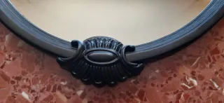 Espejo ovalado con apliques de pared