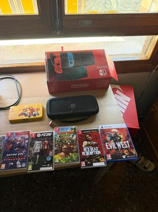 Nintendo Switch + 5 Videojuegos