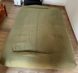 Sofá cama verde de tela