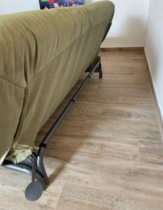 Sofá cama verde de tela