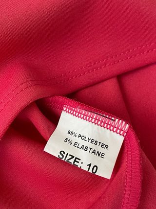 Vestido de fiesta fucsia con tiras cruzadas