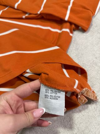 Polo manga larga Lacoste naranja rayas
