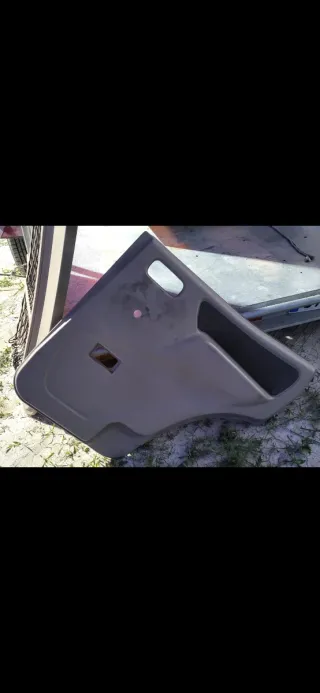Cartonera/panel Puerta Trasera copiloto Nissan ter
