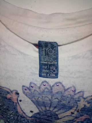 Camiseta Zara sin mangas con pedrería talla M.