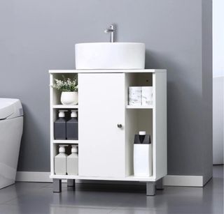 Mueble de baño blanco con puerta corredera
