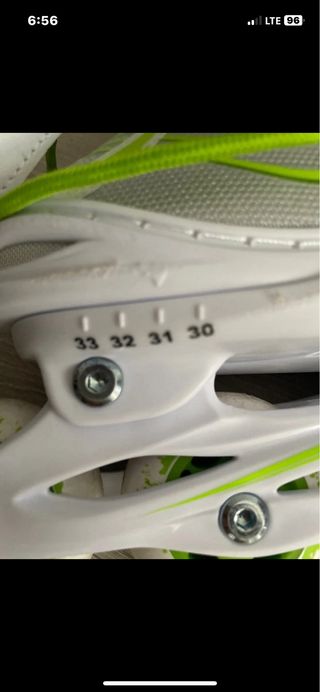 Patines en línea verdes y blancos