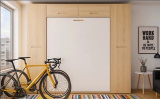 HABITACIÓN CON CAMA ABATIBLE VERTICAL 135×190 WIN.