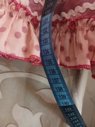 Traje de Flamenca rosa con flecos