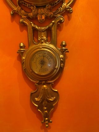 Orologio antico in ottone con quadranti