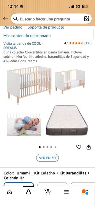 Cuna de madera y blanca