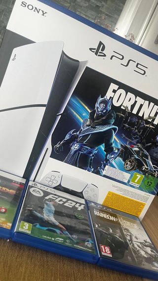 Playstation 5 con 2 mandos + juegos