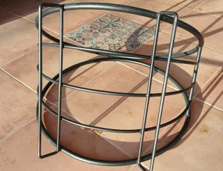 Leñero de forja redondo