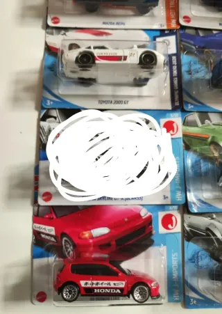 12 Hot wheels  japoneses antigos