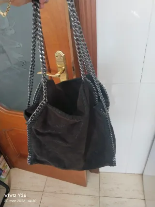 Bolso de mano con cadena