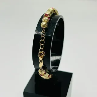 Pulsera Oro con Piedras Rojas