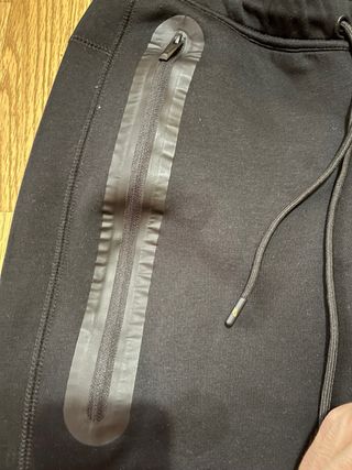 Pantalones Nike NOCTA Negros y Dorados