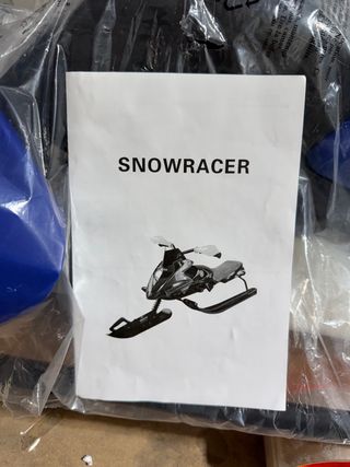 Moto de nieve infantil azul