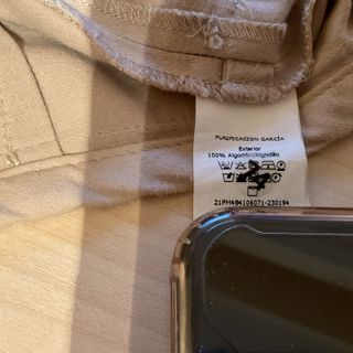 Falda beige con cremalleras